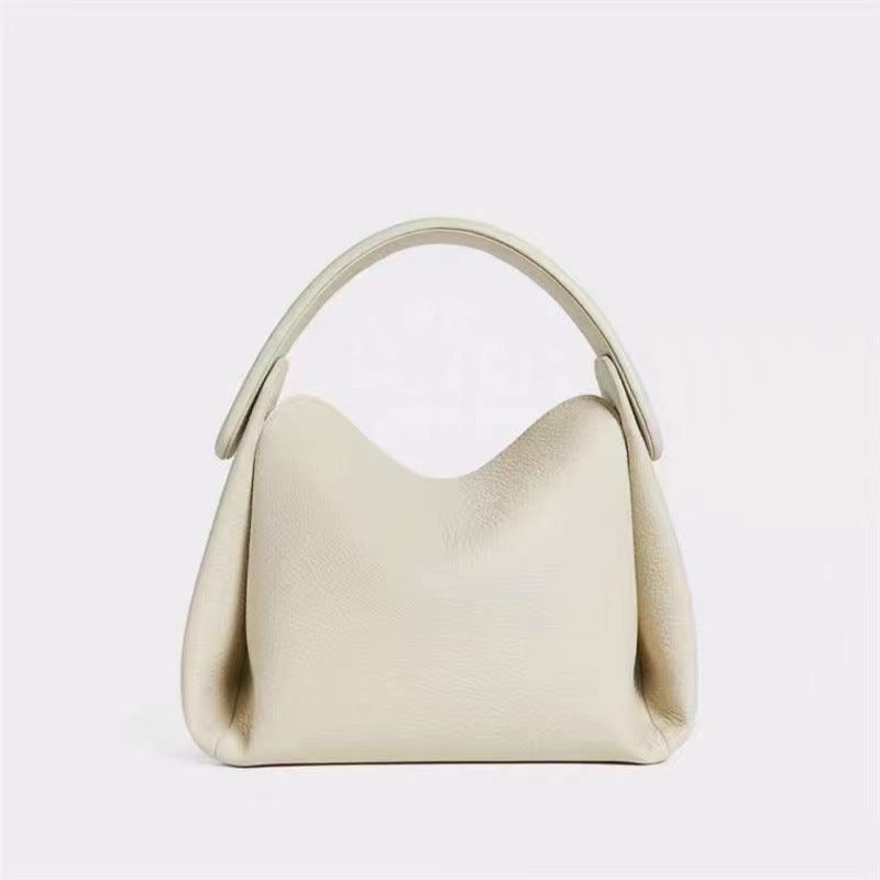 White  Minimalist Genuine Leather Small Bag  with a minimalist design on a light gray background