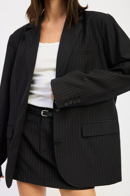 Chic Women’s Tailored Blazer – Black Striped Oversized button front Jacket on model 