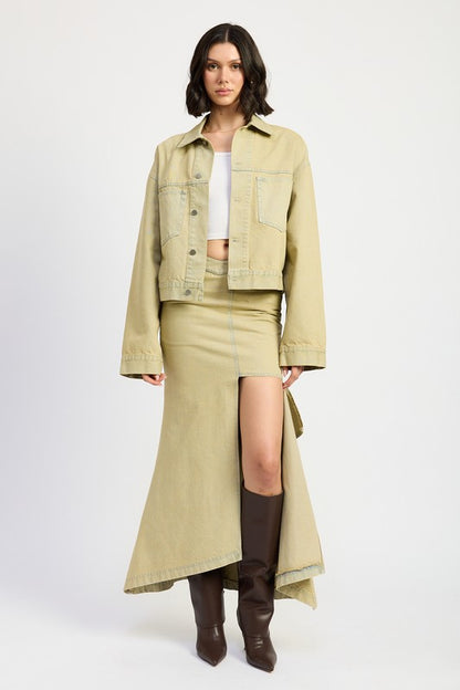 Woman wearing a Oversized sandstone beige denim jacket front view – luxury women’s outerwear