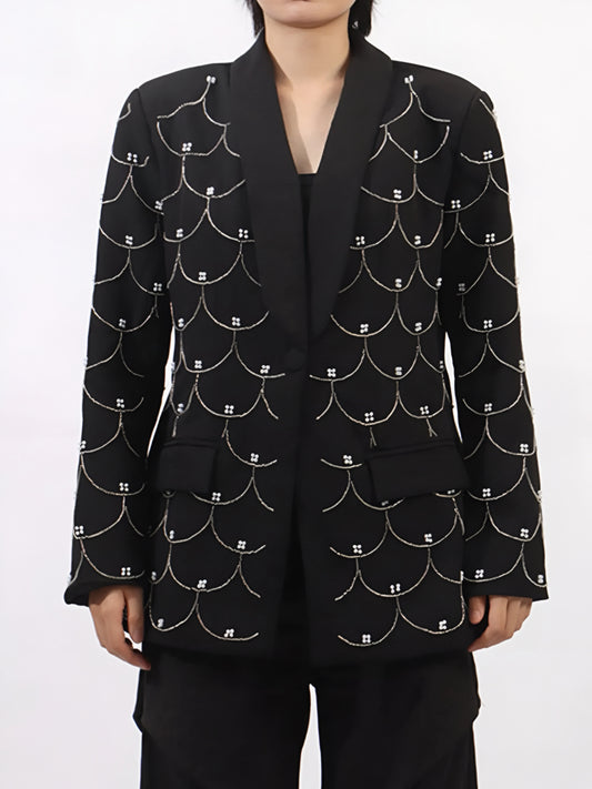 front view of woman wearing a black luxury couture designer inspired pearl-embellished statement fashion blazer 