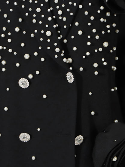 Close up of Luxury pearl embellished black blazer for women