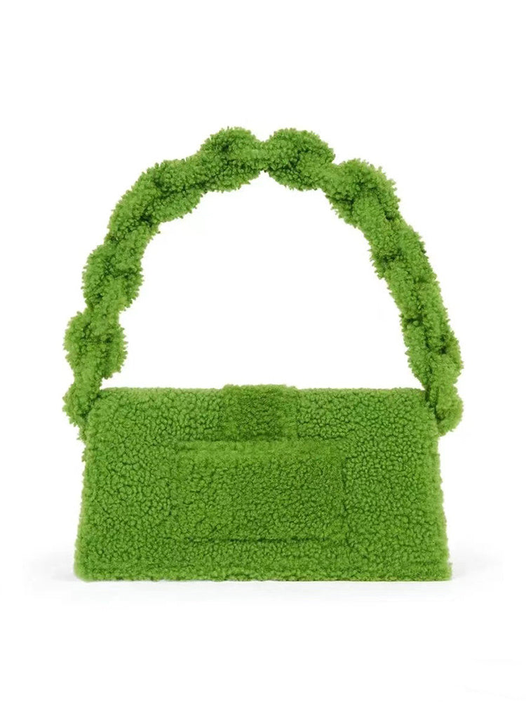 Soft fuzzy green sherpa purse with structured flap and chunky handle back view