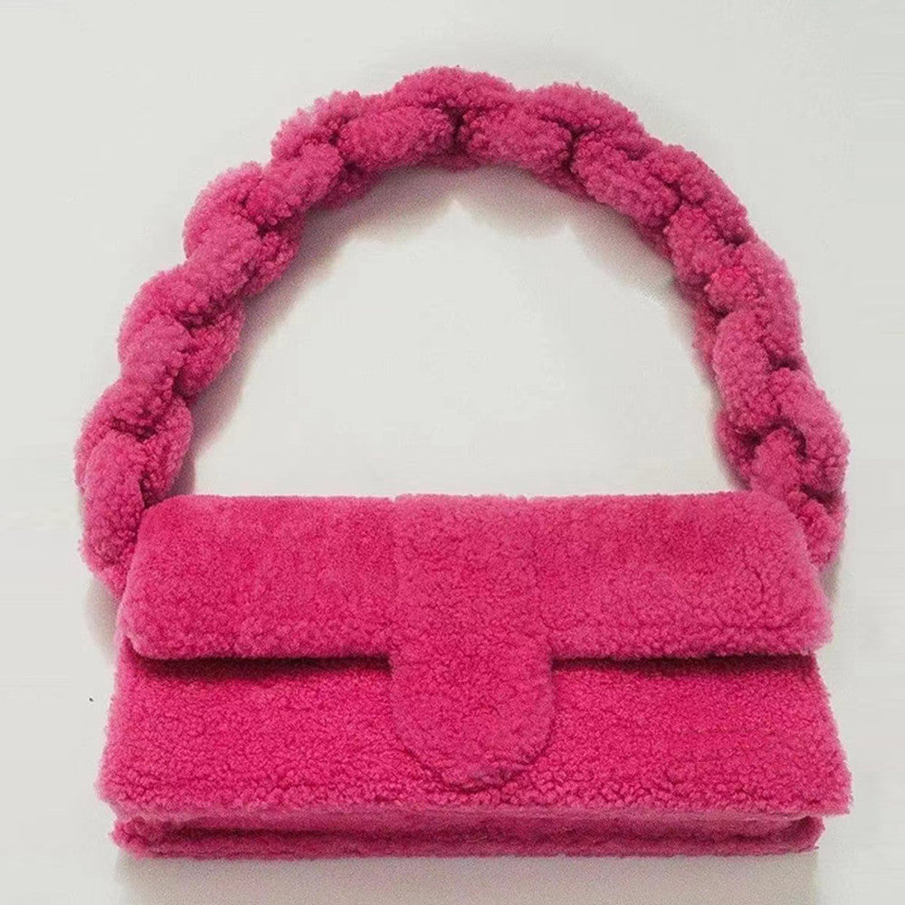 Bold pink cozy-textured purse with braided top handle