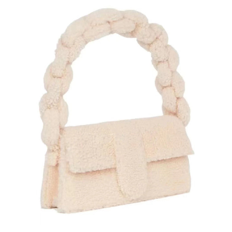 Bold white sherpa-textured purse with braided top handle