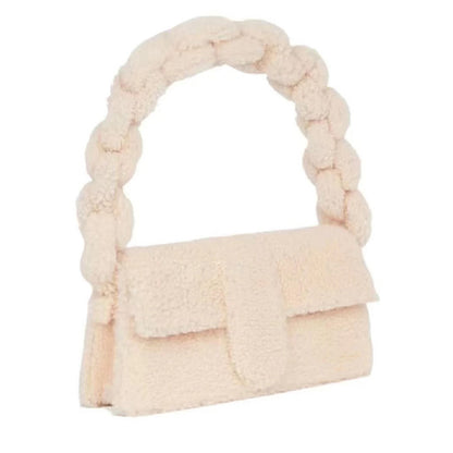 Bold white sherpa-textured purse with braided top handle