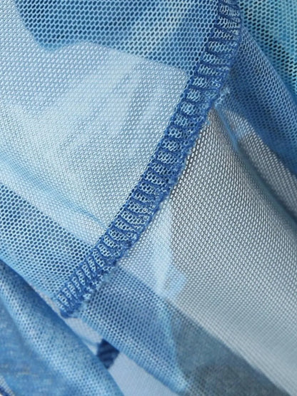 Close-up of blue floral mini cami dress inside seam 