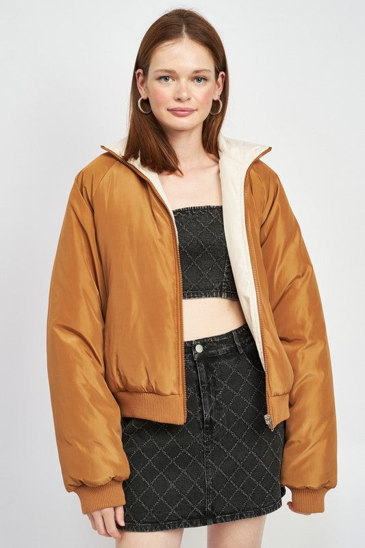 Model wearing reversible puffer jacket for women outerwear front view