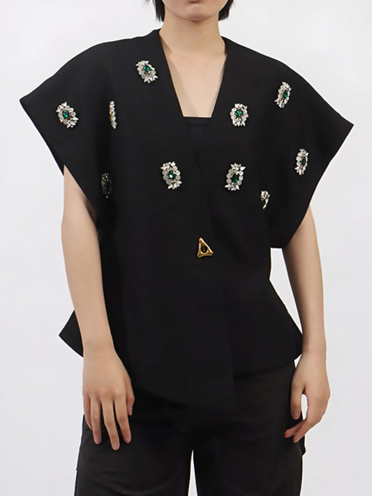 woman wearing a black statement sparkle vest coat top in inclusive sizing M–3XL
