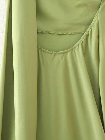 Ribbon  A-line halter dress showing open back view with drape close up view