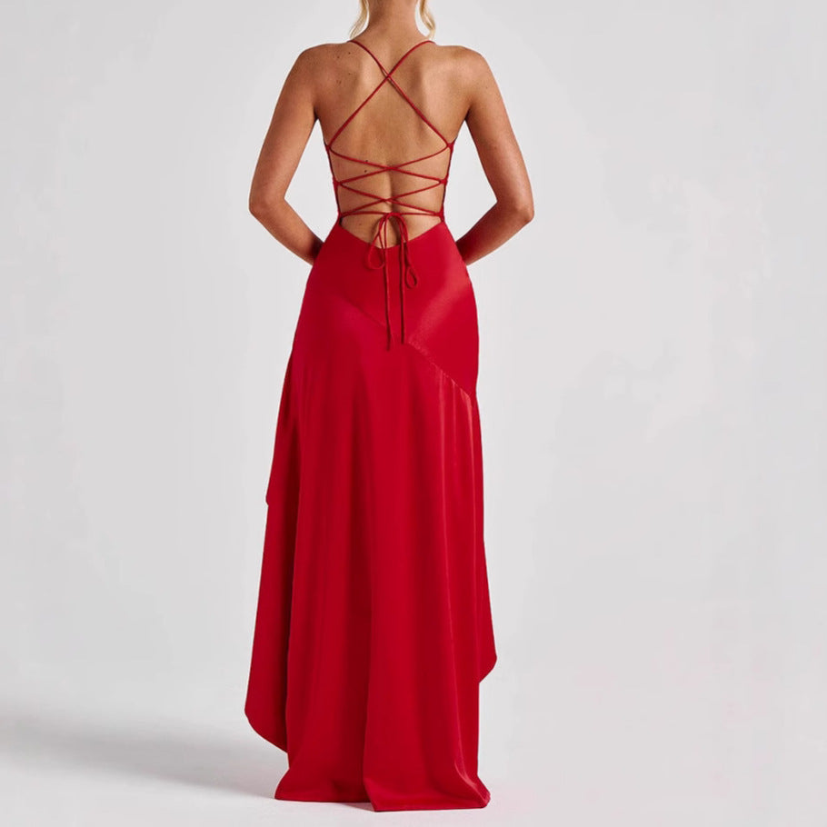 Red maxi formal dress with open back on a white background