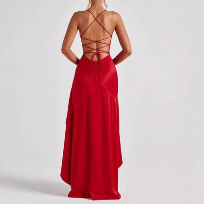Red maxi formal dress with open back on a white background