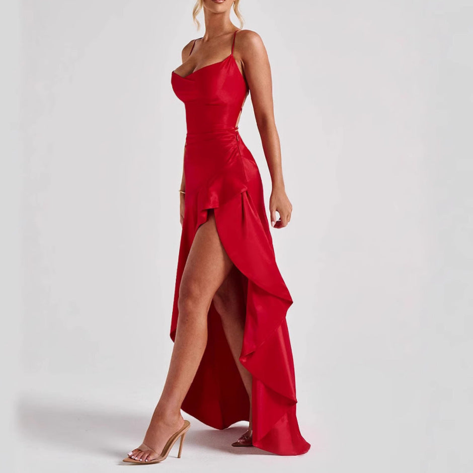 Red evening gown with a high slit on a white background