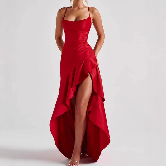 Red evening gown with a high slit on a white background