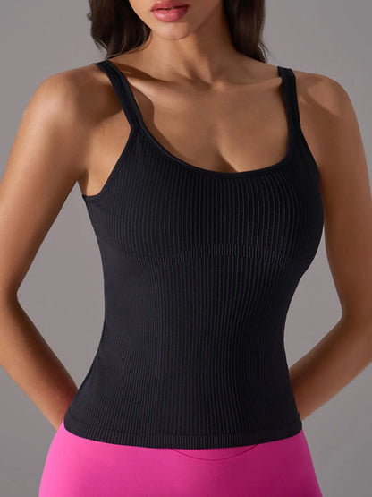 Breathable and stretchy athletic tank top in black on model front view