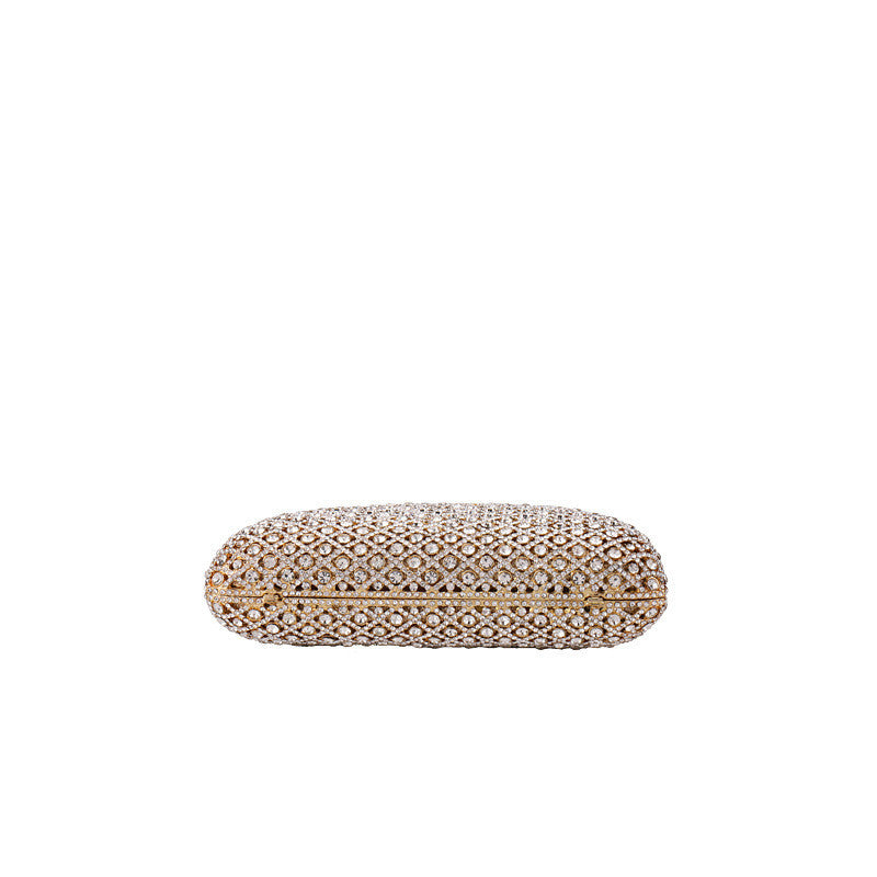 Elegant gold clutch with structured design and clasp top bottom view on white background
