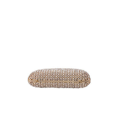 Elegant gold clutch with structured design and clasp top bottom view on white background