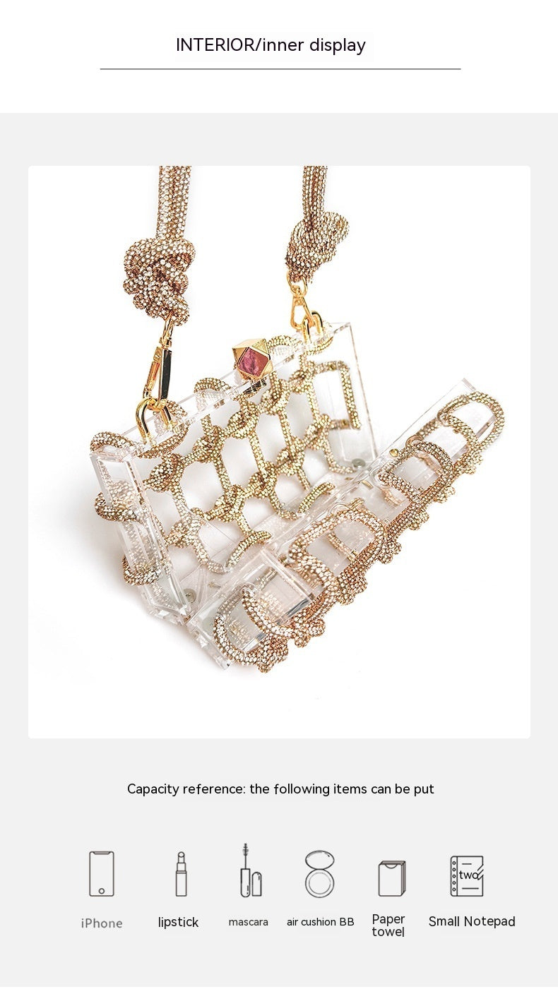 interior display of shiny rhinestone-encrusted champagne acrylic handbag in a square shape with a single handle and gold-colored hardware