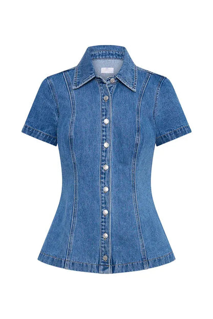 front view of blue light wash denim collared neck short sleeve top / shirt for women on a white background