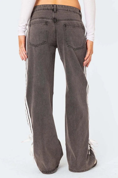 Model wearing dark wash side Striped Loose Fit Jeans back view 