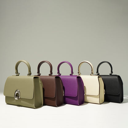 Showcasing of variety of colors of genuine leather bags in green, black, brown, white/ivory and purple.
