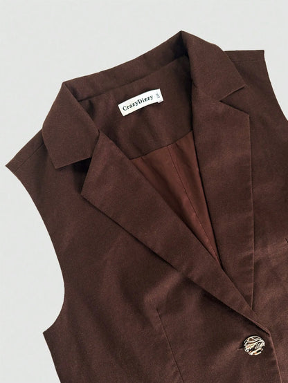 Brown vest neckline close up of two piece pant suit set on a white background