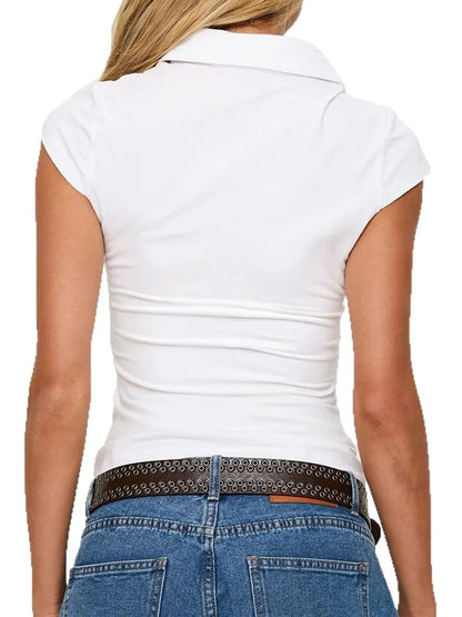 Model wearing sporty polo top with cap sleeves back view