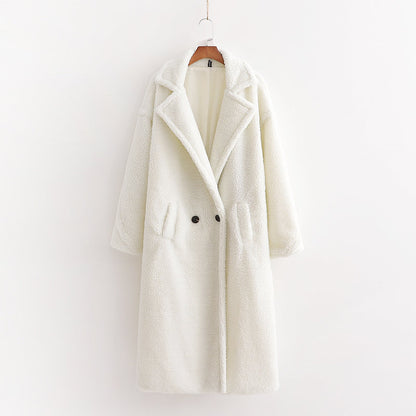 A long white plush teddy coat with long sleeves, front buttons and pockets, displayed on a hanger against a white background.
