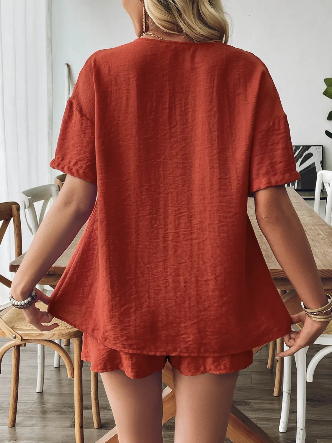 Lightweight summer outfit with tie front top and shorts back view on model
