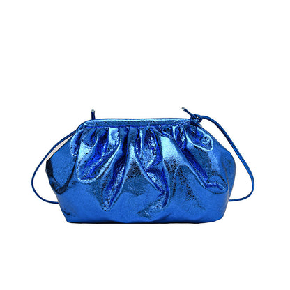 A metallic blue colored clip shell bag  Pu leather with detachable strap.