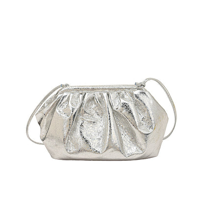 A silver metallic colored clip shell bag  PU leather with detachable strap