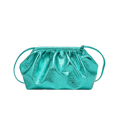 A metallic teal colored  PU leather clip shell bag with detachable strap.