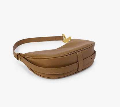 bottom view of brown genuine leather shoulder bag with adjustable strap on white background