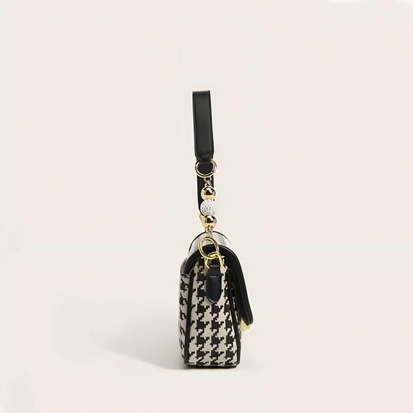 Classic houndstooth pattern purse with gold hardware and pearl-like bead accents